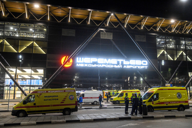 Ambulances are parked in front of the terminal building of the Sheremetyevo Airport outside Moscow after a Russian-made Superjet-100 on fire attempted an emergency landing on May 5, 2019. [Photo: AFP]