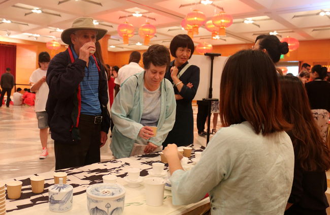 Visitors experience the traditional Chinese culture at the open house event of the Chinese embassy in the U.S. on May 4, 2019. [Photo: China Plus]