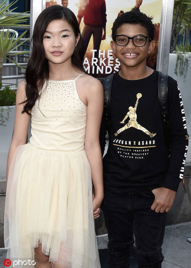 Miya Cech and Lonnie Chavis at the special screening of 20th Century Fox's "The Darkest Minds" at ArcLight Hollywood on July 26, 2018 in Hollywood, California. [Photo: IC]