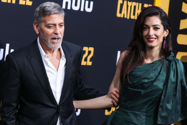 Actor George Clooney and wife Amal Clooney arrive at the Los Angeles Premiere of Hulu's "Catch-22" at the TCL Chinese Theatre IMAX in Hollywood, California on May 7, 2019. [Photo:IC]