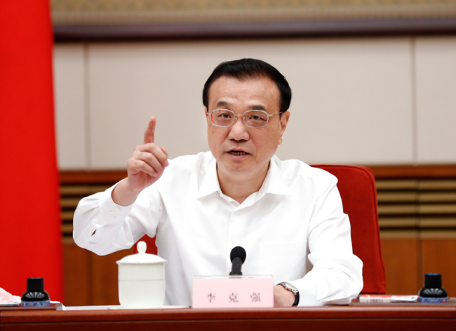 Chinese Premier Li Keqiang speaks at a symposium on the implementation of reducing taxes and fees in Beijing on Friday, May 10, 2019. [Photo: gov.cn]