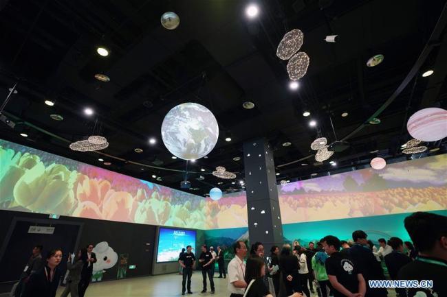 People visit ecological and meteorological house during the "World Meteorological Organization Honorary Day" theme event held as part of the Beijing International Horticultural Exhibition in Yanqing District in Beijing, capital of China, May 11, 2019. [Photo: Xinhua]