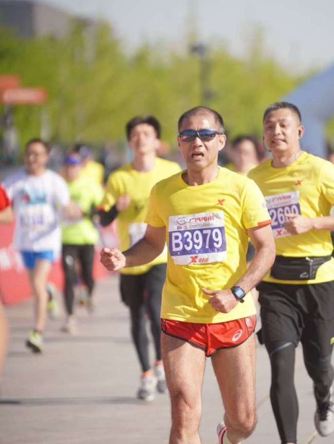 Mori Masatsugu participates in a half marathon competition in Beijing on April 4, 2019. [File Photo provided for China Plus]