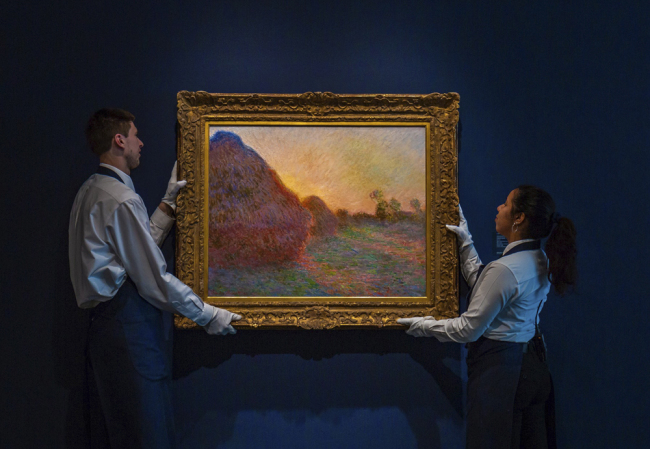 This undated photo provided by Sotheby's shows Claude Monet's painting titled "Meules." The painting, one of Monet's iconic paintings of haystacks, has fetched a record $110.7 million at an auction in New York. [Photo: AP]