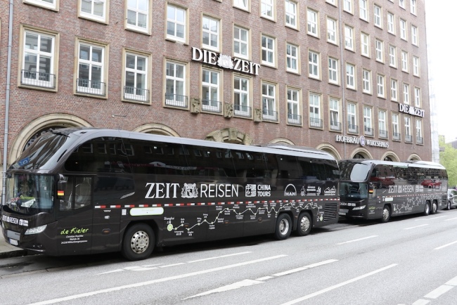 Two buses are ready to set off from Hamburg on May 17, 2019.[Photo: China Plus]