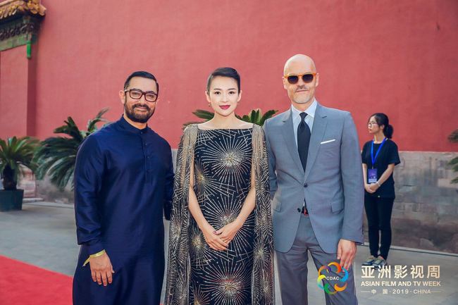 Indian actor Aamir Khan (left), Chinese actress Zhang Ziyi (center) and Russian film director Fyodor Sergeyevich Bondarchuk (right)are seen at the opening of The Asian Film Week in Beijing on Thursday, May 16, 2019. [Photo provided to China Plus]