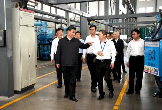 President Xi Jinping inspects the JL MAG Rare-Earth Co. Ltd. in Ganzhou, Jiangxi Province on May 20, 2019. [Photo: Xinhua/Ju Peng]
