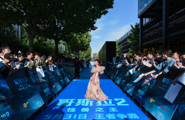 Millie Bobby Brown walked on the red carpet during a promotional event held in Beijing on May 13, 2019 for "Godzilla: King of the Monsters". [Photo: China Plus]