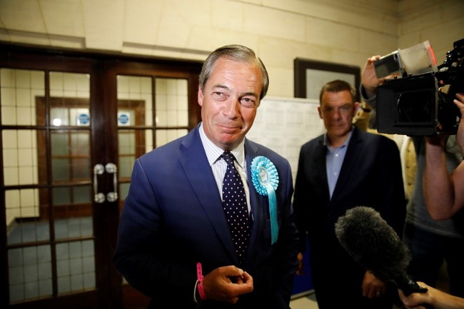 Brexit Party leader Nigel Farage reacts after the European Parliament election results for the UK South East Region are announced at the Civic Centre Southampton, Southern England, on May 26, 2019. [Photo: AFP]