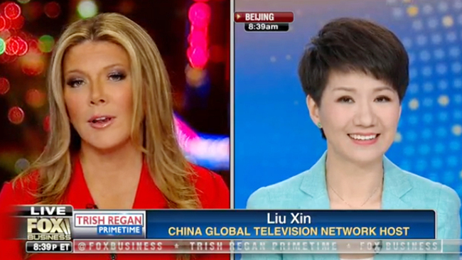 CGTN anchor Liu Xin (R) and Fox Business Network host Trish Regan in a live discussion. [Photo: CGTN]