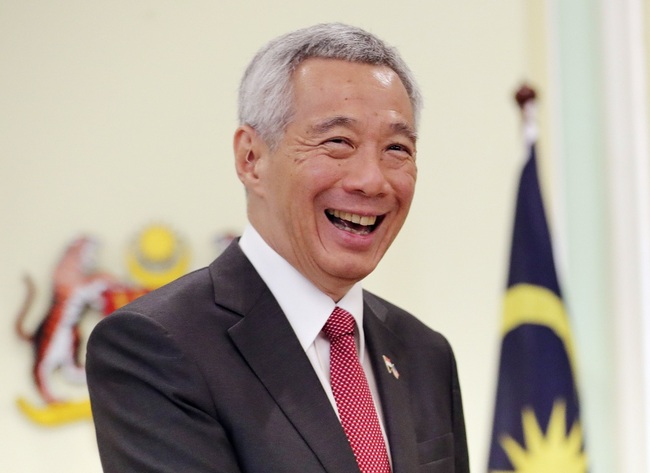 Singaporean Prime Minister Lee Hsien Loong smiles after a press conference. [File Photo: IC]