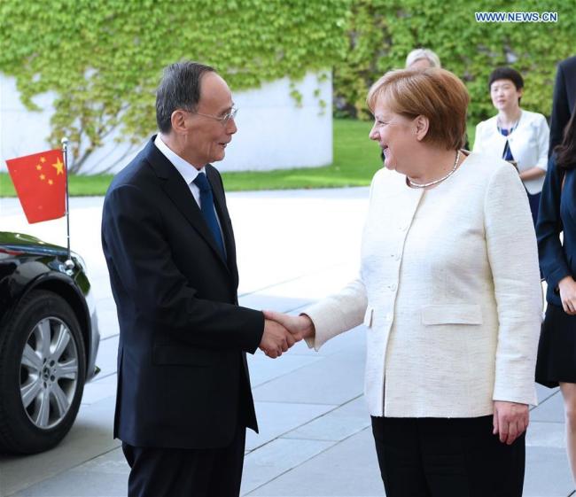 Chinese Vice President Wang Qishan meets with German Chancellor Angela Merkel in Berlin, Germany, May, 31, 2019. Wang Qishan paid a visit to Germany from Thursday to Sunday at the invitation of the German Federal Government. [Photo: Xinhua/Rao Aimin]