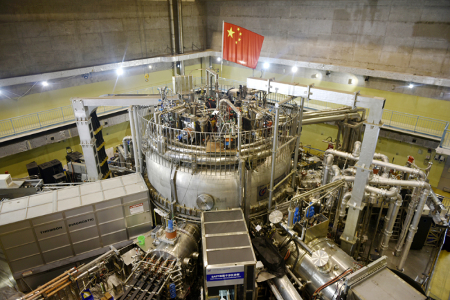Scientists have an experiment on the Experimental Advanced Superconducting Tokamak (EAST) magnetic fusion device for the International Thermonuclear Experimental Reactor (ITER), the world's largest nuclear fusion project, at the Chinese Academy of Sciences institute of plasma physics (ASIPP) in Hefei, Anhui Province, November 14, 2018. [Photo: IC]