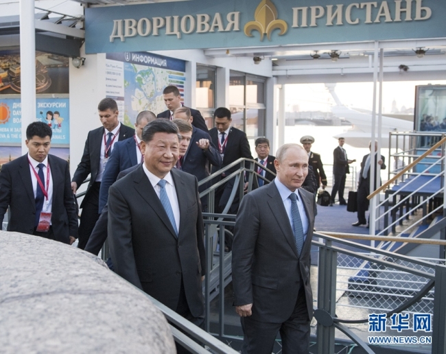 Chinese President Xi Jinping (left, front) meets with his Russian counterpart Vladimir Putin (right, front) in the latter's hometown St. Petersburg on Thursday, June 6, 2019. [Photo: Xinhua]