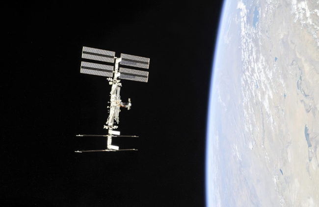 This NASA photo obtained November 4, 2018 shows the International Space Station photographed by Expedition 56 crew members from a Soyuz spacecraft after undocking. [Photo: AFP/NASA]