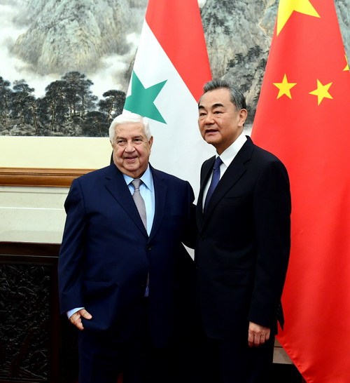 Chinese State Councilor and Foreign Minister Wang Yi (R) meets with Syrian Deputy Prime Minister and Foreign Minister Walid Mualem in Beijing on Tuesday, June 18, 2019. [Photo: fmprc.gov.cn]