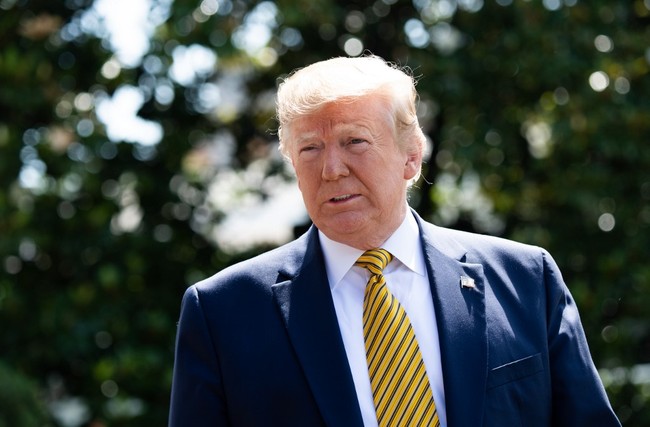 US President Donald Trump speaks to the media prior to departing on Marine One from the South Lawn of the White House in Washington, DC, June 22, 2019, as he travels to Camp David, Maryland. [Photo: AFP]