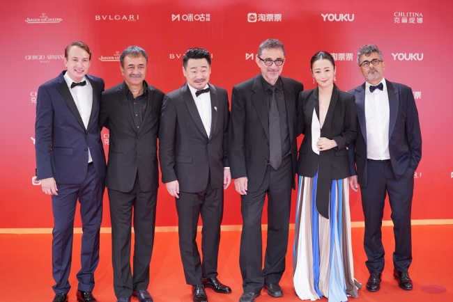 The jury for the 22nd SIFF pose on the red carpet in Shanghai, June 23, 2019. [Photo: IC]