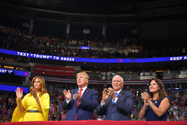 US President Donald Trump (2L), First Lady Melania Trump, US Vice President Mike Pence and Karen Pence arrive for the official launch of the Trump 2020 campaign at the Amway Center in Orlando, Florida on June 18, 2019. [File photo: AFP/Mandel Ngan]