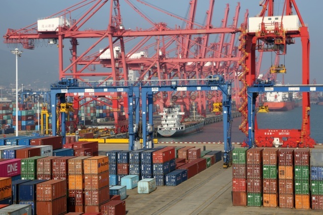 Stacks of containers wait to be shipped abroad at the port of Lianyungang, China's Jiangsu province, June 10, 2019. [File photo: IC]