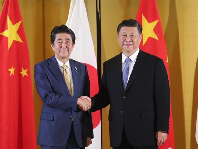 Chinese President Xi Jinping meets with Japanese Prime Minister Shinzo Abe in Osaka, Japan, June 27, 2019. [Photo: Xinhua]