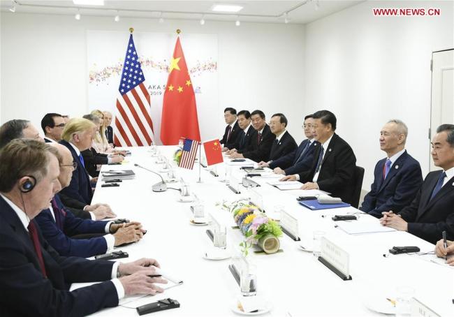 Chinese President Xi Jinping holds talks with U.S. President Donald Trump in Osaka, Japan, June 29, 2019. [Photo: Xinhua/Ju Peng]