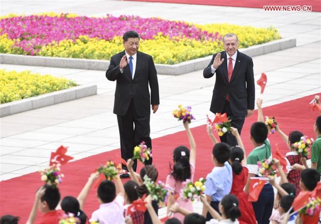 Chinese President Xi Jinping holds a welcome ceremony for Turkish President Recep Tayyip Erdogan before their talks in Beijing, capital of China, July 2, 2019. Xi held talks with Erdogan at the Great Hall of the People in Beijing on Tuesday. [Photo: Xinhua/Yin Bogu]
