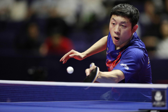 Xu Xin of China in action during the men's singles final at the Seamaster 2019 ITTF World Tour Platinum Lion Japan Open in Sapporo, northern Japan, Sunday, June 16, 2019. [Photo: IC]