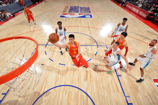 Fang Shuo #5 of China shoots the ball against the Charlotte Hornets in the NBA Summer League on July 8, 2019 at the Cox Pavilion in Las Vegas, Nevada. [Photo: VCG]