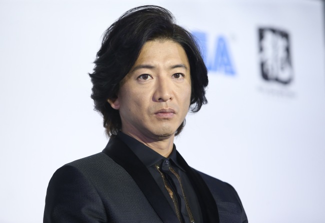 Japanese actor and singer Takuya Kimura attends a promotional event for the video game "Judge Eyes" in Taipei, Taiwan, on December 2, 2018. [Photo: IC]