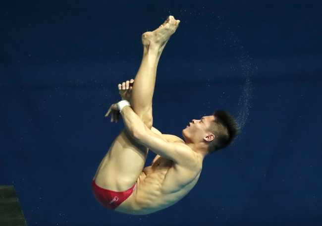 China's Yang Jian competes in the mixed team event diving final at the World Swimming Championships in Gwangju, South Korea, Tuesday, July 16, 2019. [Photo: IC]