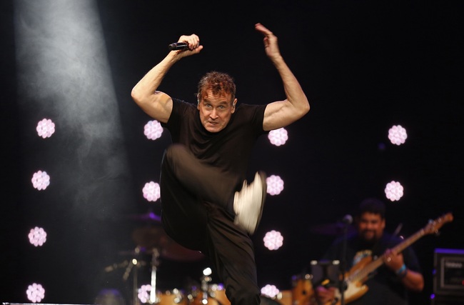 In this Saturday, Nov. 11, 2017 file photo, musician Johnny Clegg performs on stage during his own farewell concert in Johannesburg. [Photo: AP]