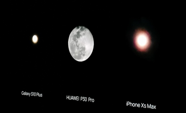 A picture of the moon taken by Huawei P30 Pro and other phones displayed at a Huawei product launch in Shanghai on April 11, 2019. The moon shooting mode of the Huawei P30 Pro has been granted a patent, which was recently mentioned in a document released by China’s State Intellectual Property Office. [Photo: IC] 