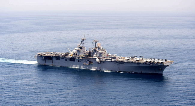 A handout image released by the U.S. Navy Media Content Operations shows the amphibious assault ship USS Boxer (LHD 4) transits the Arabian Gulf to conduct missions in support of Operation Inherent Resolve, at an undisclosed location in the Arabian Gulf, June 16, 2016. [File photo: IC]