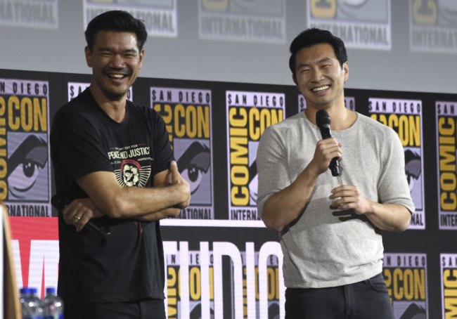 Destin Daniel Cretton, left, and Simu Liu speaks during the "Shang-Chi and The Legend of the Ten Rings" portion of the Marvel Studios panel on day three of Comic-Con International on Saturday, July 20, 2019, in San Diego. [Photo: IC]