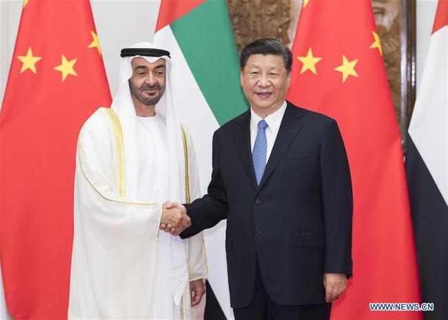 Chinese President Xi Jinping (R) meets with Sheikh Mohammed bin Zayed Al Nahyan, crown prince of Abu Dhabi of the United Arab Emirates, at the Diaoyutai State Guesthouse in Beijing, capital of China, July 22, 2019. [Photo: Xinhua/Huang Jingwen]<br><br>