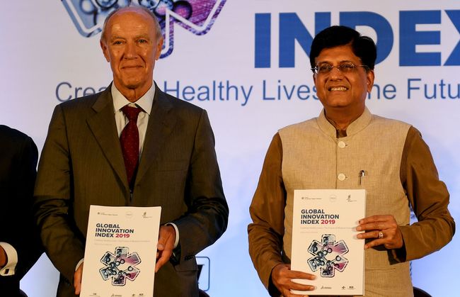 Indian Minister of Commerce and Industry and Minister of Railways Piyush Goyal (R) and Director General World Intellectual Property Organization (WIPO) Francis Gurry pose for photographs as they release the Global Innovation Index 2019 report during an event in New Delhi on Wednesday, July 24, 2019. [Photo: VCG/AFP/Money Sharma]