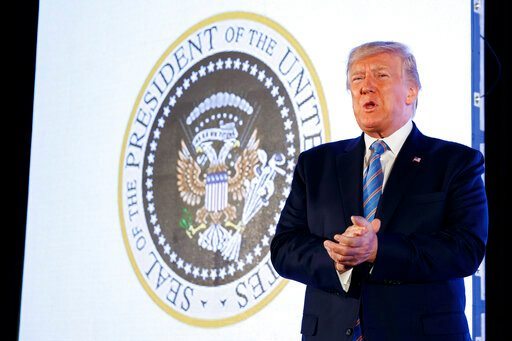 President Donald Trump arrives to speak, with an altered presidential seal behind him, at Turning Point USA's Teen Student Action Summit 2019, Tuesday, July 23, 2019, in Washington. [Photo: AP/Alex Brandon]