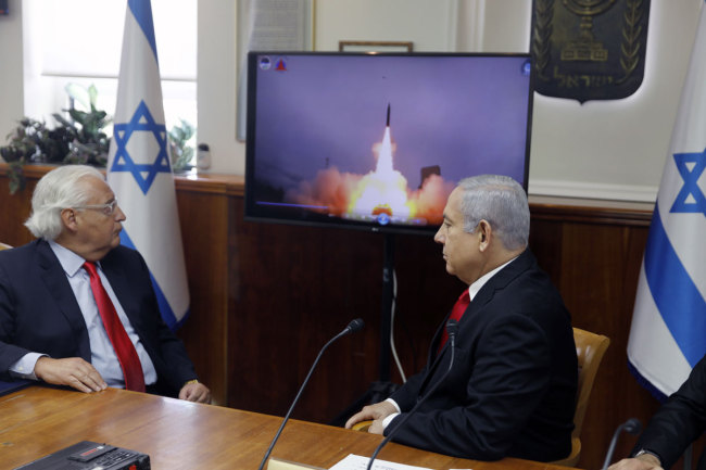 Israeli Prime Minister Benjamin Netanyahu (right) and US Ambassador to Israel David Friedman watch a video which shows the launch of the Arrow 3 hypersonic anti-ballistic missile during a cabinet meeting in Jerusalem Sunday, July 28, 2019. [Photo: IC]