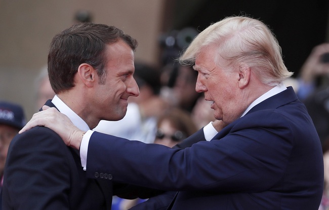 File Photo: French President Emmanuel Macron, left, meets U.S President Donald Trump during a ceremony to mark the 75th anniversary of D-Day at the Normandy American Cemetery in Colleville-sur-Mer, Normandy, France on June 6, 2019. [Photo: AP/POOL/Ian Langsdon]<br>