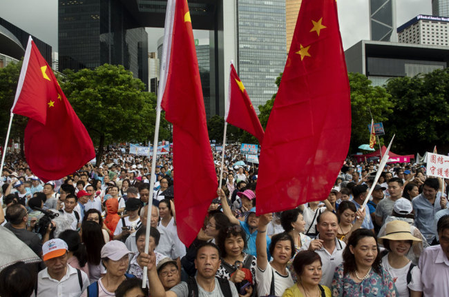 People rally to oppose violence at a park in Hong Kong on July 20, 2019. [File photo: IC]