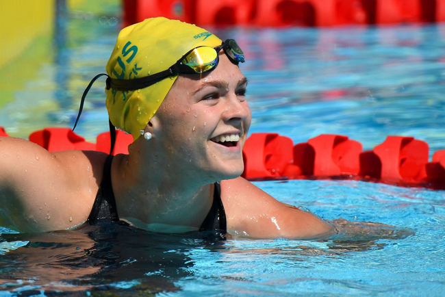 Australia's Shayna Jack smiles after the swimming women's 50m freestyle qualifications during the 2018 Gold Coast Commonwealth Games at the Optus Aquatic Centre in the Gold Coast on April 6, 2018. [File Photo: AFP via VCG]