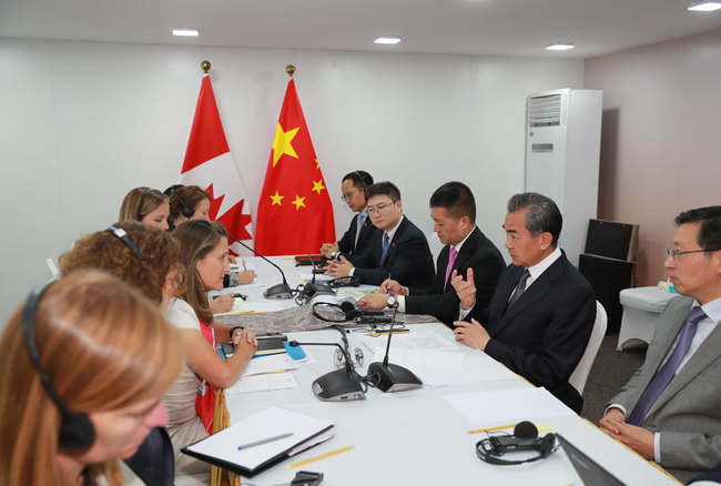 Chinese State Councilor and Foreign Minister Wang Yi meets with Canadian Foreign Minister Chrystia Freeland [Photo: fmprc.gov]