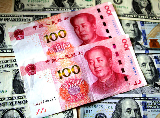 The Chinese yuan breaks through 7 per U.S. dollar on August 5, 2019. [File Photo: IC]