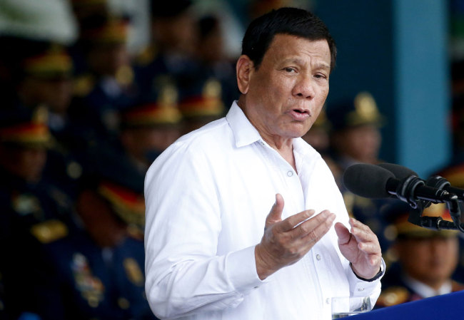 Philippines President Rodrigo Duterte addresses the police force to mark the 117th anniversary of Philippine National Police Service at Camp Crame in Quezon city, northeast of Manila, August 8, 2018. [File photo: IC]