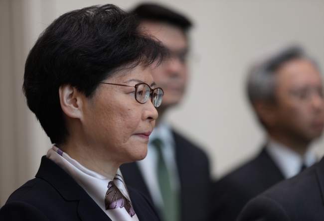 Hong Kong Chief Executive Carrie Lam (L) speaks during a press conference in Hong Kong, August 5, 2019. [Photo: EPA via IC/JEROME FAVRE]