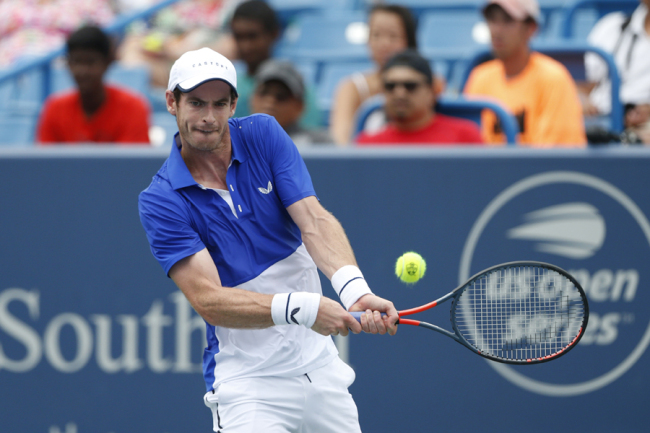 Andy Murray, of Great Britain, returns a backhand against Richard Gasquet, of France, during first round play at the Western & Southern Open tennis tournament, Monday, Aug. 12, 2019, in Mason, Ohio.  [Photo: IC]