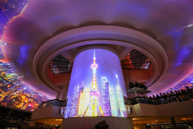 Shanghai's Oriental Pearl Radio and Television Tower is now showcasing three dome projection shows every night this month. [Photo: IC]