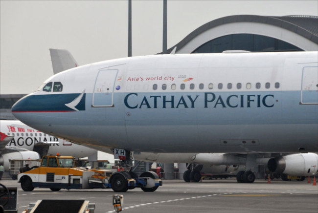 A Cathay Pacific plane at Hong Kong International Airport [File photo: IC]