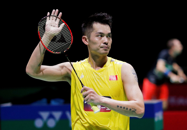 China's Lin Dan celebrates after winning his men's singles first round match against Vietnam's Nguyen Tien Minh, August 19, 2019. [Photo: Reuters via VCG/Arnd Wiegmann]